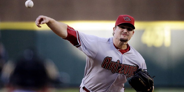 Arizona Diamondbacks starting pitcher Zack Godley throws against the Seattle Mariners in the first ...