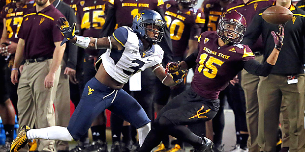 Arizona State wide receiver Devin Lucien (15) can't make the catch as West Virginia cornerback Rick...