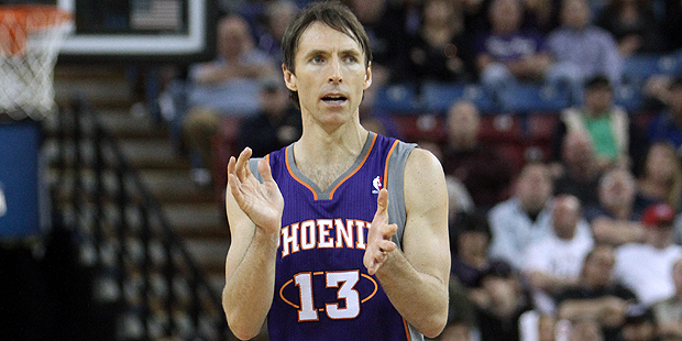 Phoenix Suns guard Steve Nash claps after scoring in the closing moments against the Sacramento Kin...