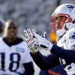 New England Patriots wide receiver Michael Floyd catches a pass as Matthew Slater (18) looks on during an NFL football team practice Wednesday, Dec. 21, 2016, in Foxborough, Mass. (AP Photo/Elise Amendola)