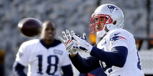New England Patriots wide receiver Michael Floyd catches a pass as Matthew Slater (18) looks on dur...
