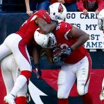 Arizona Cardinals defensive end Calais Campbell (93) celebrates his fumble recovery for a touchdown with teammate Patrick Peterson, left, during the first half of an NFL football game against the New Orleans Saints, Sunday, Dec. 18, 2016, in Glendale, Ariz. (AP Photo/Ross D. Franklin)