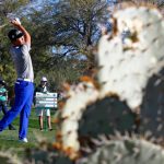 Kevin Na hits his approach shot from the second fairway during the final round of the Waste Management Phoenix Open golf tournament Sunday, Feb. 5, 2017, in Scottsdale, Ariz. (AP Photo/Ross D. Franklin)