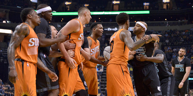 Players with the Memphis Grizzlies and Phoenix Suns confront each other on the court in the first h...