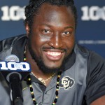 Colorado offensive tackle Stephane Nembot speaks to reporters during NCAA college Pac-12 Football Media Days, Thursday, July 30, 2015, in Burbank, Calif. (AP Photo/Mark J. Terrill)