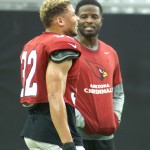 Defensive backs Jerraud Powers and Tyrann Mathieu chat at Arizona Cardinals training camp, Wednesday, August 26 at University of Phoenix Stadium. (Photo: Adam Green/Arizona Sports)