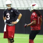 Quarterback Carson Palmer and receiver Larry Fitzgerald during training camp Aug. 1, 2015 (Photo by Adam Green/Arizona Sports)