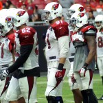 The Cardinals defense gets ready for the snap during training camp Aug. 17. (Photo: Adam Green/Arizona Sports)