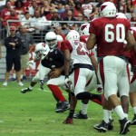 QB Logan Thomas scrambles toward the end zone during Arizona Cardinals training camp Aug. 8. (Photo by Adam Green/Arizona Sports)