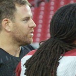 QB Carson Palmer and WR Larry Fitzgerald watch at Arizona Cardinals training camp Thursday, August 27, 2015 in Glendale. (Photo: Adam Green/Arizona Sports)