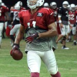 Larry Fitzgerald finishes a route during training camp Aug. 18. (Photo: Adam Green/Arizona Sports)