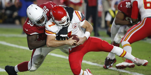 Kansas City Chiefs' Aaron Murray (7) gets tackled in the end zone by Arizona Cardinals' Rodney Gunt...