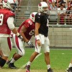 Quarterback Chandler Harnish looks downfield after throwing a pass at Arizona Cardinals Training Camp in Glendale Wednesday, Aug. 5, 2015. (Photo: Vince Marotta/Arizona Sports)