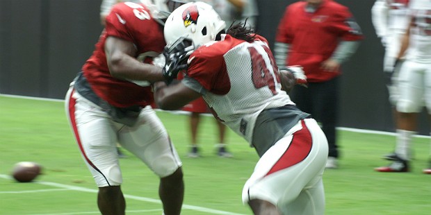 Markus Golden rushes during a drill in Arizona Cardinals training camp Monday, Aug. 3. (Photo by Ad...
