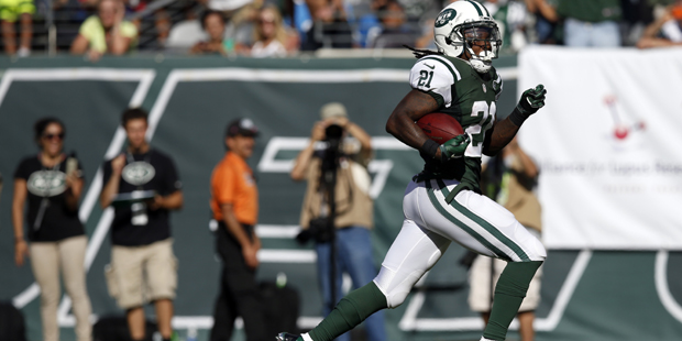 New York Jets running back Chris Johnson is unchallenged during a scoring run against the Detroit L...