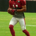 Wide receiver Larry Fitzgerald hauls in a pass on the sideline at Arizona Cardinals Training Camp in Glendale Wednesday, Aug. 5, 2015. (Photo: Vince Marotta/Arizona Sports)