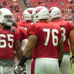 The offensive line does drill work at University of Phoenix Stadium Friday, August 7, 2015. (Photo: Vince Marotta/Arizona Sports)