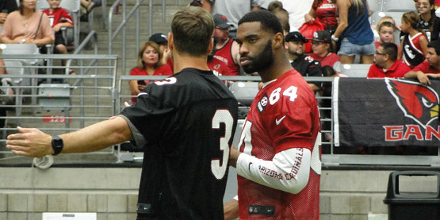 QB Carson Palmer and tight end Jermaine Gresham chat at Arizona Cardinals Training Camp in Glendale...