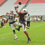 Tyrann Mathieu (32) breaks up a pass intended for Larry Fitzgerald at Arizona Cardinals Training Camp in Glendale Monday, August 3, 2015. (Photo: Vince Marotta/Arizona Sports)