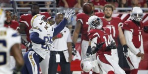 Arizona Cardinals wide receiver J.J. Nelson (14) pulls in a pass as San Diego Chargers cornerback Richard Crawford (35) defends during the first half of an NFL preseason football game, Saturday, Aug. 22, 2015, in Glendale, Ariz. (AP Photo/Ross D. Franklin)