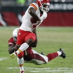 Kansas City Chiefs wide receiver Da'Ron Brown is tackled by Arizona Cardinals linebacker Gabe Martin during the second half of an NFL preseason football game, Saturday, Aug. 15, 2015, in Glendale, Ariz. (AP Photo/Rick Scuteri)