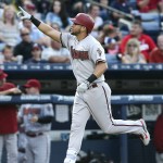 Arizona Diamondbacks' David Peralta (6) gestures as he rounds the bases after hitting a solo-home run in the fourth innings of a baseball game against the Atlanta Braves Saturday, Aug. 15, 2015, in Atlanta. (AP Photo/John Bazemore)