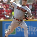 Arizona Diamondbacks starting pitcher Chase Anderson throws against the Cincinnati Reds in the first inning of a baseball game, Sunday, Aug. 23, 2015, in Cincinnati. (AP Photo/David Kohl)