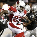 Arizona Cardinals running back Marion Grice (23) evades tackles for an 11-yard touchdown against the Oakland Raiders during the second half of an NFL preseason football game in Oakland, Calif., Sunday, Aug. 30, 2015. The Cardinals won 30-23. (AP Photo/Tony Avelar)