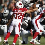Oakland Raiders wide receiver Rod Streater catches a pass in front of Arizona Cardinals free safety Tyrann Mathieu (32) during the first half of an NFL preseason football game in Oakland, Calif., Sunday, Aug. 30, 2015. (AP Photo/Tony Avelar)
