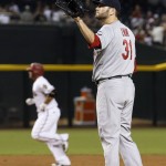 St. Louis Cardinals' Lance Lynn (31) gets a new baseball after giving up a home run to Arizona Diamondbacks' Welington Castillo, left, during the second inning of a baseball game Monday, Aug. 24, 2015, in Phoenix. (AP Photo/Ross D. Franklin)