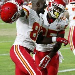 Kansas City Chiefs' Frankie Hammond, right, celebrates his touchdown catch against the Arizona Cardinals with teammate Jason Avant, left, during the first half of an NFL preseason football game Saturday, Aug. 15, 2015, in Glendale, Ariz. (AP Photo/Ross D. Franklin)