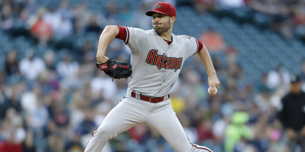 Arizona Diamondbacks starting pitcher Robbie Ray works against the Seattle Mariners during the firs...