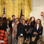 President Barack Obama greets Phoenix Mercury basketball team members in the East Room of the White House in Washington, Wednesday, Aug. 26, 2015, during a ceremony honoring the 2014 WNBA basketball Champions Phoenix Mercury. (AP Photo/Andrew Harnik)