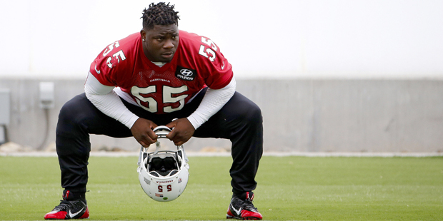 Arizona Cardinals' Sean Weatherspoon stretches out during an NFL football organized team activity, ...