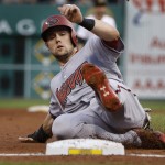 Arizona Diamondbacks' Chris Owings slides into third from second on a sacrifice fly in the second inning of a baseball game, Monday, Aug. 17, 2015, in Pittsburgh. (AP Photo/Keith Srakocic)