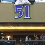 Randy Johnson's Arizona Diamondbacks jersey number, 51, is unveiled during a ceremony to mark the retiring of the number, before the Diamondbacks played the Cincinnati Reds in a baseball game Saturday, Aug. 8, 2015, in Phoenix. (AP Photo/Ralph Freso)