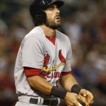 St. Louis Cardinals' Matt Carpenter reacts after getting hit by a pitch in the fourth inning during a baseball game against the Arizona Diamondbacks, Tuesday, Aug. 25, 2015, in Phoenix. (AP Photo/Rick Scuteri)