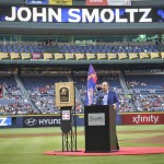 Former Atlanta Braves pitcher John Smoltz is honored for his induction into the Baseball Hall of Fame before the start of a baseball game against the Arizona Diamondbacks, Friday, Aug. 14, 2015, in Atlanta. (AP Photo/John Amis)