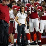 Arizona Cardinals training camp coach Jen Welter watches from the sideline during the second half of the team's NFL preseason football game against the San Diego Chargers on Saturday, Aug. 22, 2015, in Glendale, Ariz. (AP Photo/Matt York)