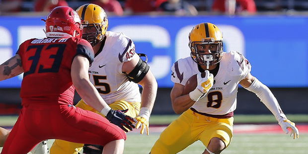 Arizona State running back D.J. Foster (8) runs for a first down during the second half of an NCAA ...