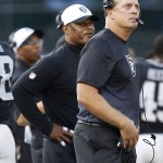 Oakland Raiders head coach Jack Del Rio, right, and defensive coordinator Ken Norton Jr. watch during the first half of an NFL preseason football game against the Arizona Cardinals in Oakland, Calif., Sunday, Aug. 30, 2015. (AP Photo/Tony Avelar)