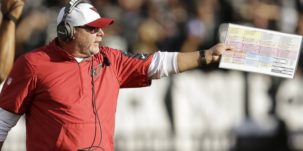 Arizona Cardinals head coach Bruce Arians gestures during the first half of an NFL preseason footba...