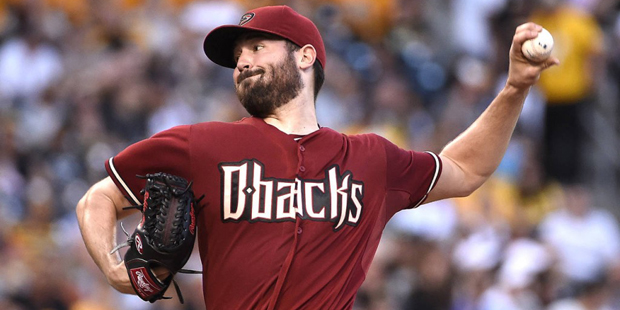 Arizona Diamondbacks pitcher Robbie Ray throws during the first inning of a baseball game against t...