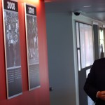 Owner Michael Bidwill looks at a wall going over the team's history. (Photo by Adam Green/Arizona Sports)