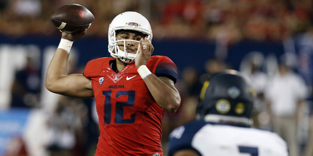 Arizona quarterback Anu Solomon (12) throws downfield against Northern Arizona during the first hal...