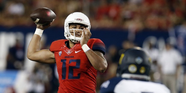 Arizona quarterback Anu Solomon (12) throws downfield against Northern Arizona during the first hal...