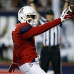 Arizona wide receiver David Richards reacts after scoring a touchdown during the first half of an NCAA college football game against Northern Arizona, Saturday, Sept. 19, 2015, in Tucson, Ariz. (AP Photo/Rick Scuteri)