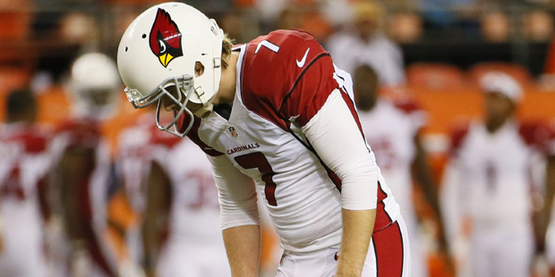 Arizona Cardinals kicker Chandler Catanzaro (7) looks down after missing a point after during the s...