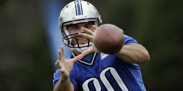 Detroit Lions tight end Joseph Fauria catches a ball during the NFL football training camp in Allen...