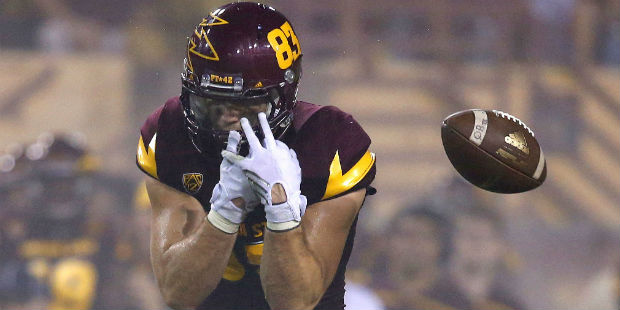 Arizona State's Kody Kohl drops a pass during the first half of an NCAA college football game again...